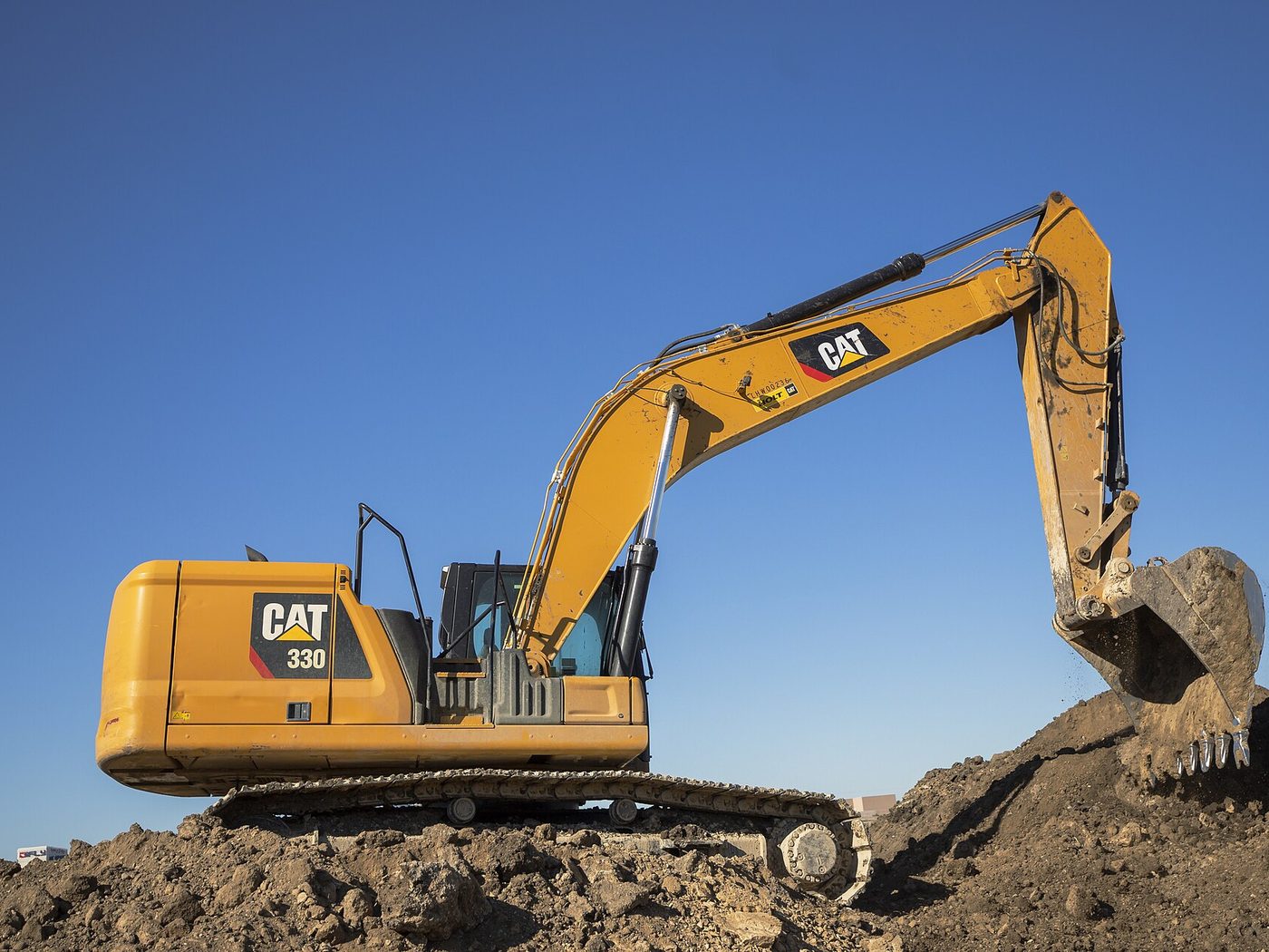 An excavator on an underground utility site